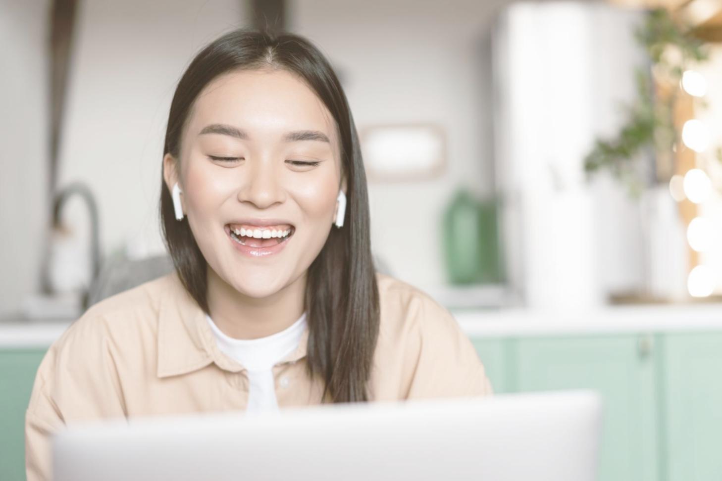 Group of students collaborating on financial planning exercises in modern learning space